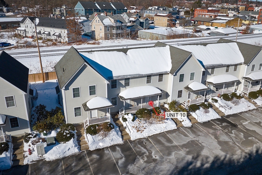 8 Hockanum Road, Unit 10 Northampton, MA 01060 - Photo 27 of 34 a view of a patio with table and chairs stove and barbeque grill