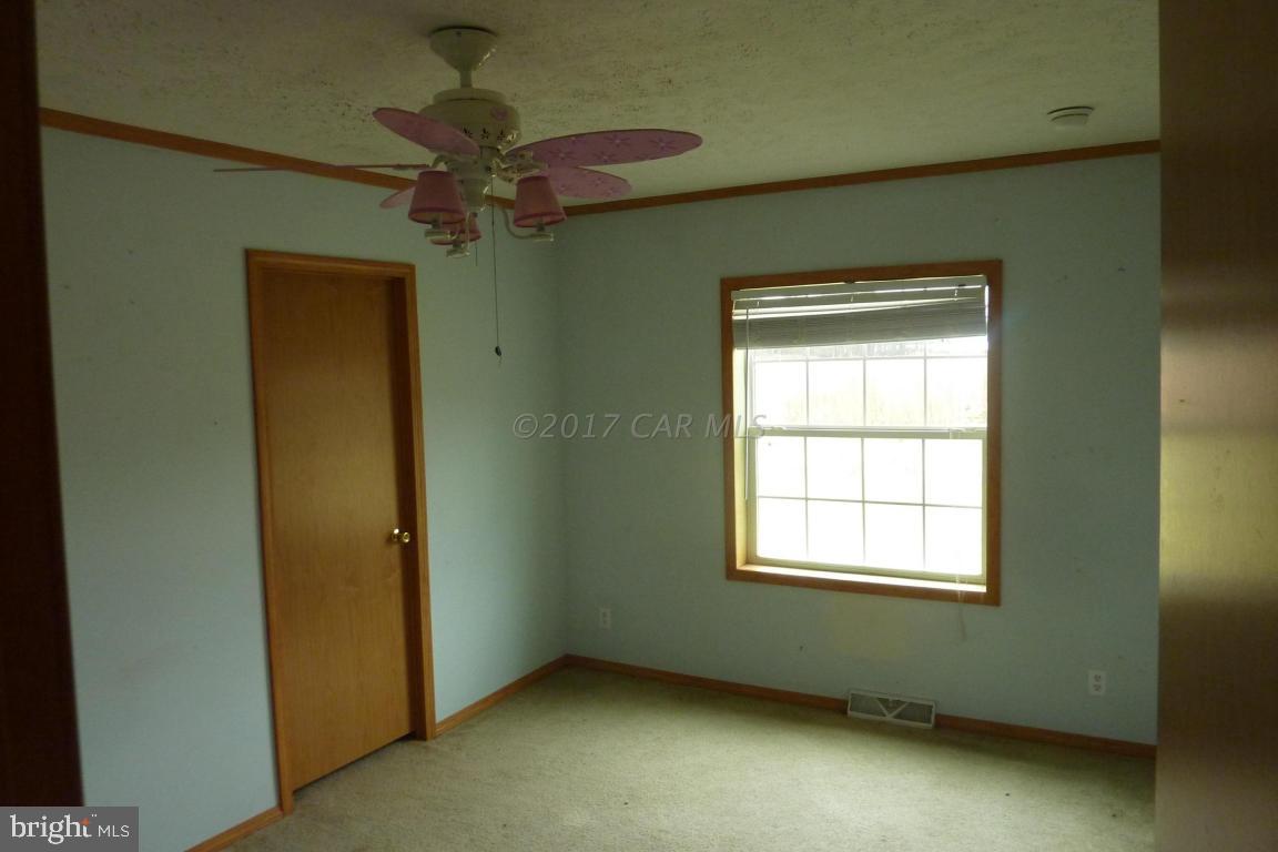 6380 Powellville Road Willards, MD 21874 - Photo 9 of 10 an empty room with a window