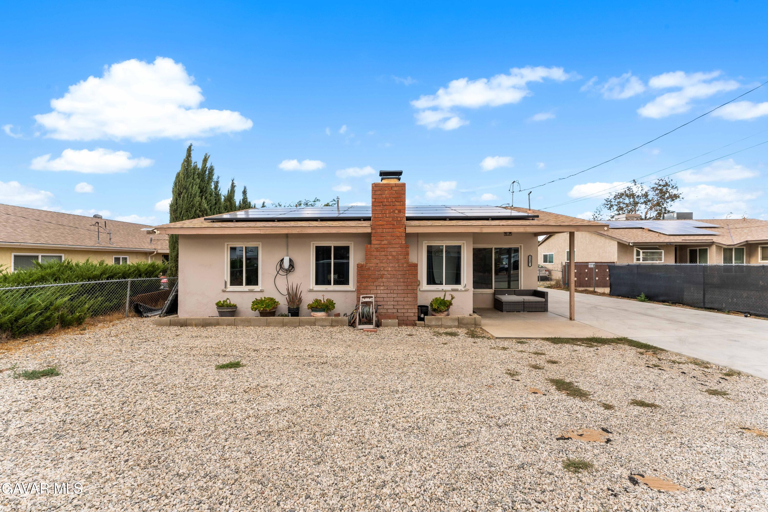 5237 West Ave L8 Lancaster, CA 93536 - Photo 34 of 38 a view of a house with backyard