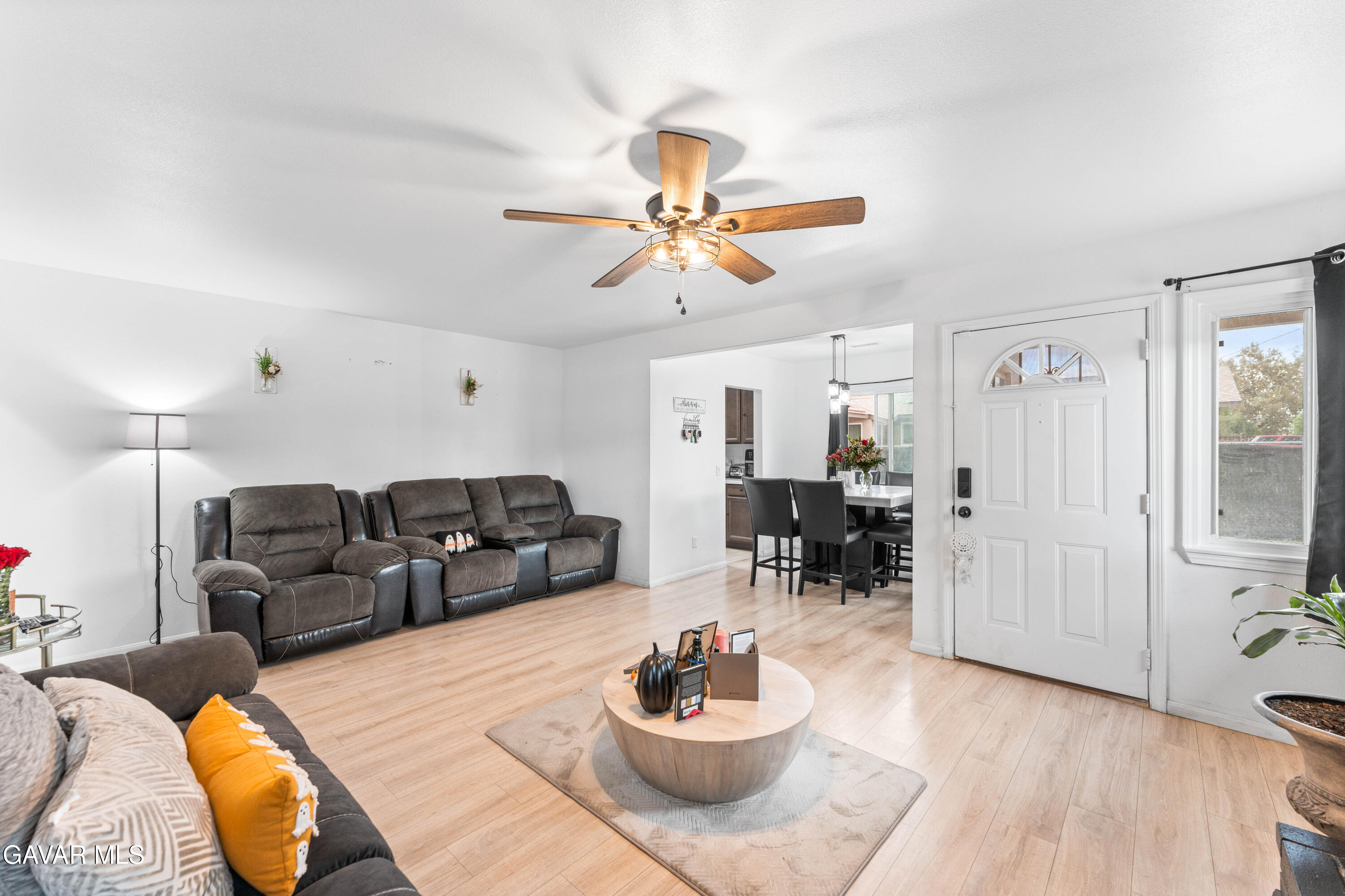 5237 West Ave L8 Lancaster, CA 93536 - Photo 5 of 38 a living room with furniture and a wooden floor