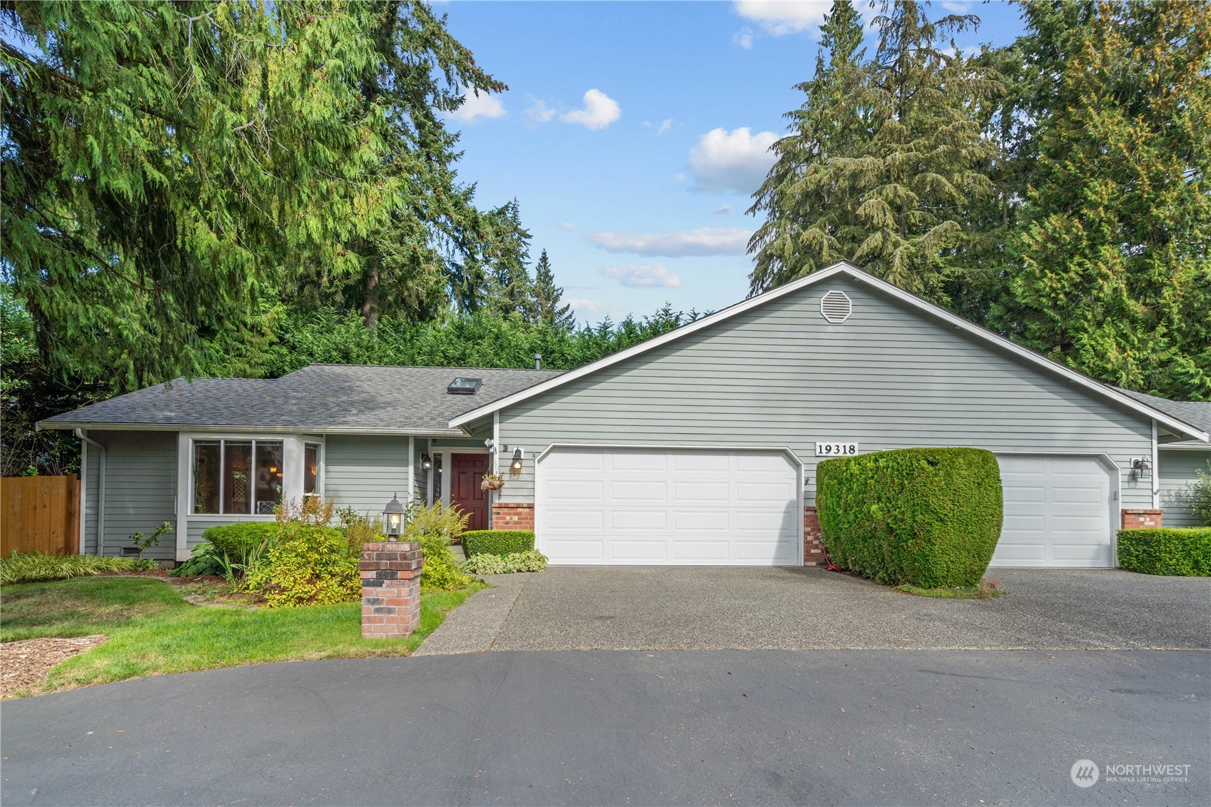 19318 2nd Drive Southeast, Unit B Bothell, WA 98012 - Photo 1 of 28 a house view with a garden space