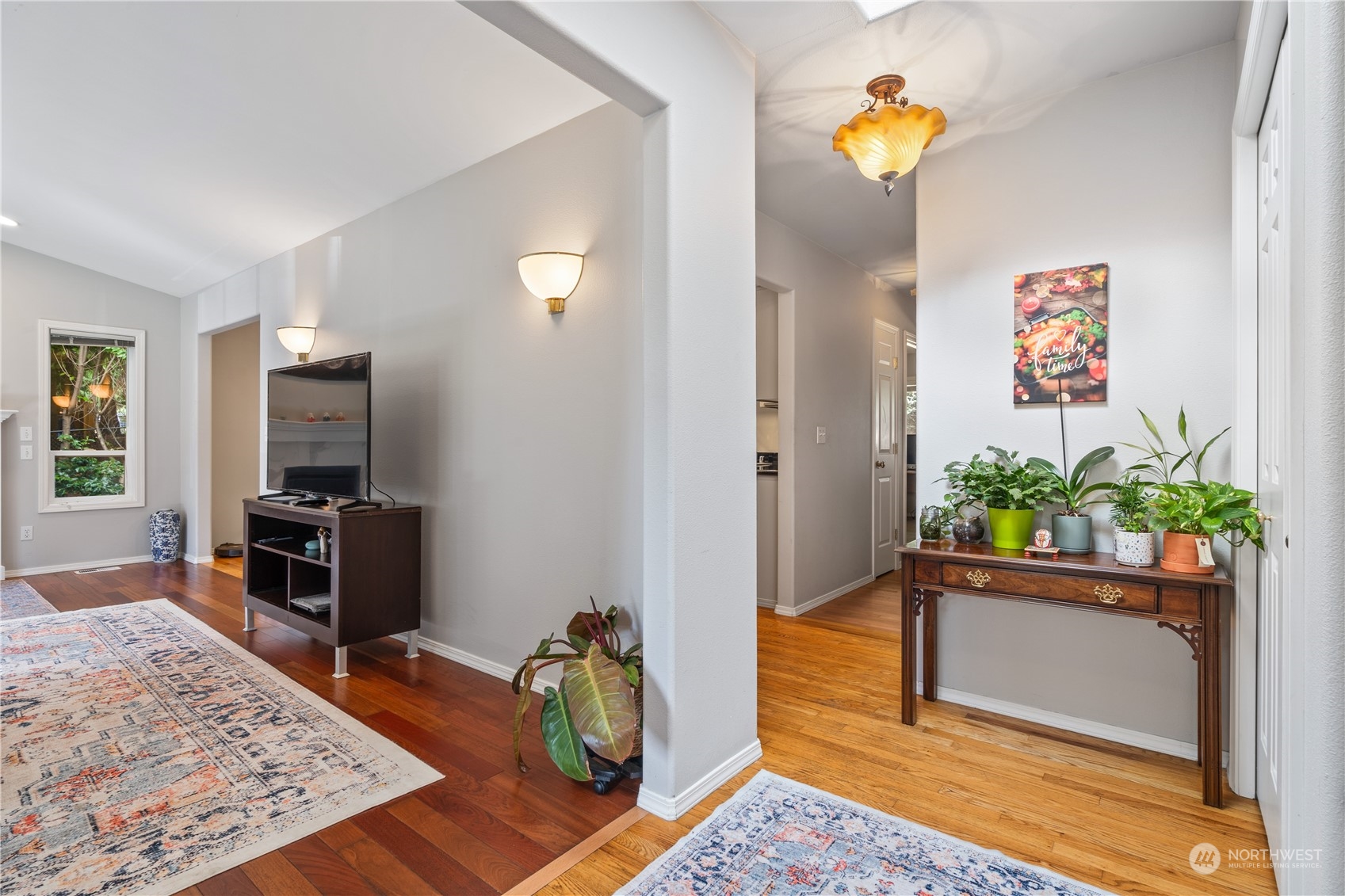 19318 2nd Drive Southeast, Unit B Bothell, WA 98012 - Photo 11 of 28 a living room with furniture and a potted plant
