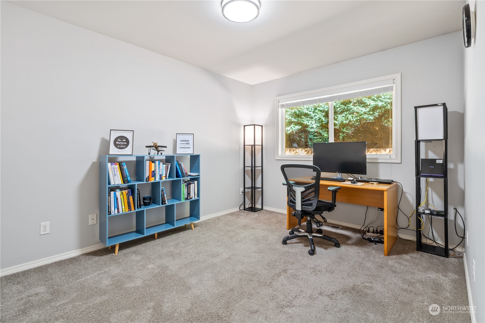 19318 2nd Drive Southeast, Unit B Bothell, WA 98012 - Photo 22 of 28 a view of a workspace with furniture and a window