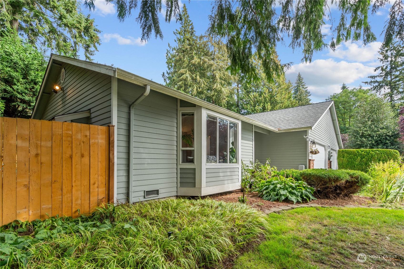 19318 2nd Drive Southeast, Unit B Bothell, WA 98012 - Photo 27 of 28 a view of a house with a yard