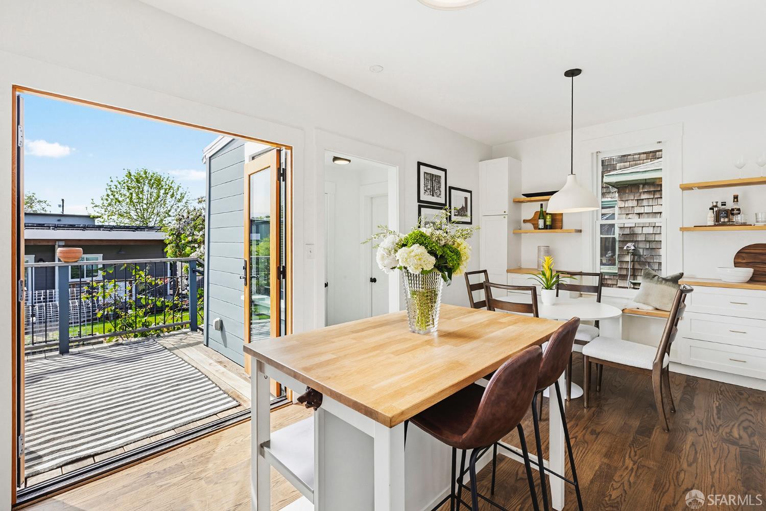 1610 Oregon Street Berkeley, CA 94703 - Photo 24 of 68 a view of a dining room with furniture window and wooden floor