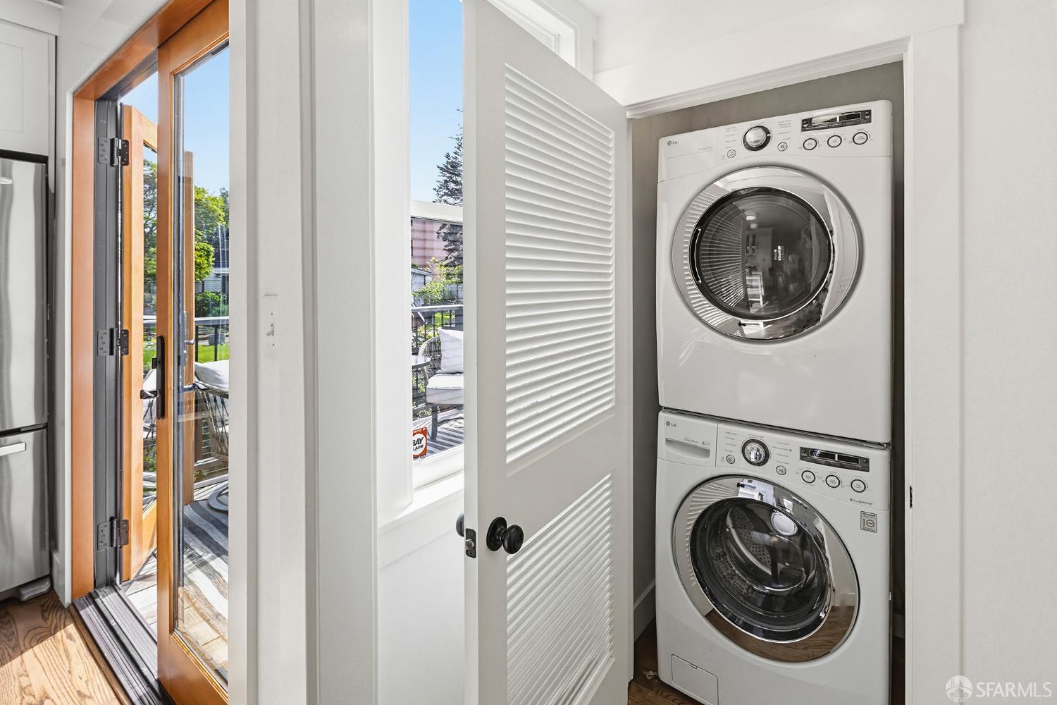 1610 Oregon Street Berkeley, CA 94703 - Photo 27 of 68 a view of a hallway with washer and dryer