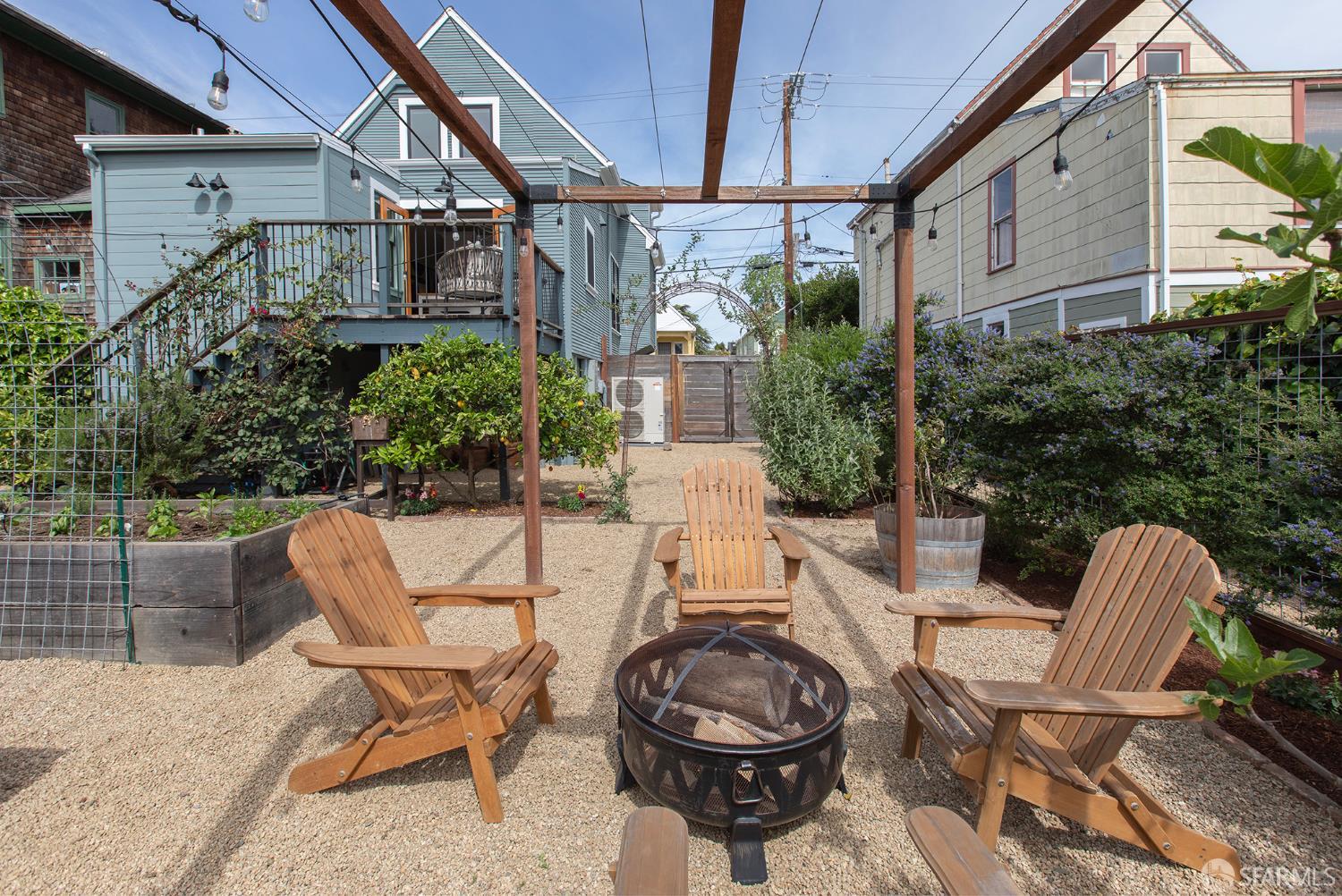 1610 Oregon Street Berkeley, CA 94703 - Photo 53 of 68 a view of a chair and table in backyard