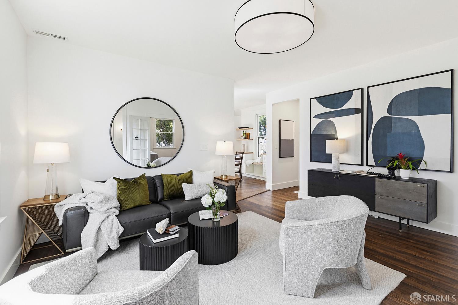 1610 Oregon Street Berkeley, CA 94703 - Photo 10 of 68 a living room with furniture a mirror and a mirror