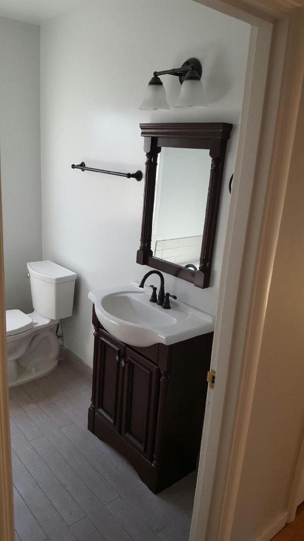 117 Talbot Avenue Santa Rosa, CA 95404 - Photo 6 of 7 a bathroom with a sink and a mirror