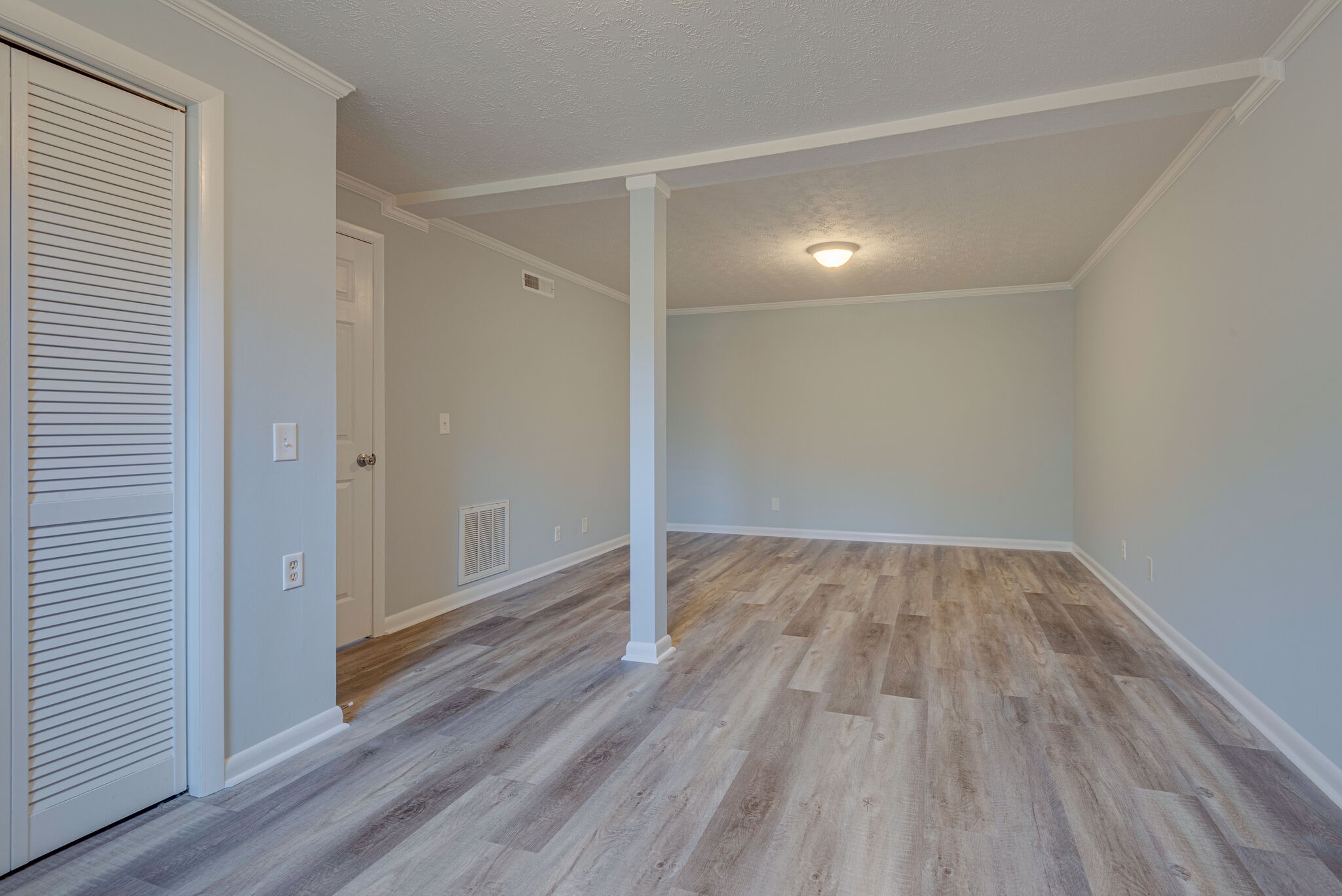 7715 Chester Road Fairview, TN 37062 - Photo 22 of 26 a view of an empty room with wooden floor
