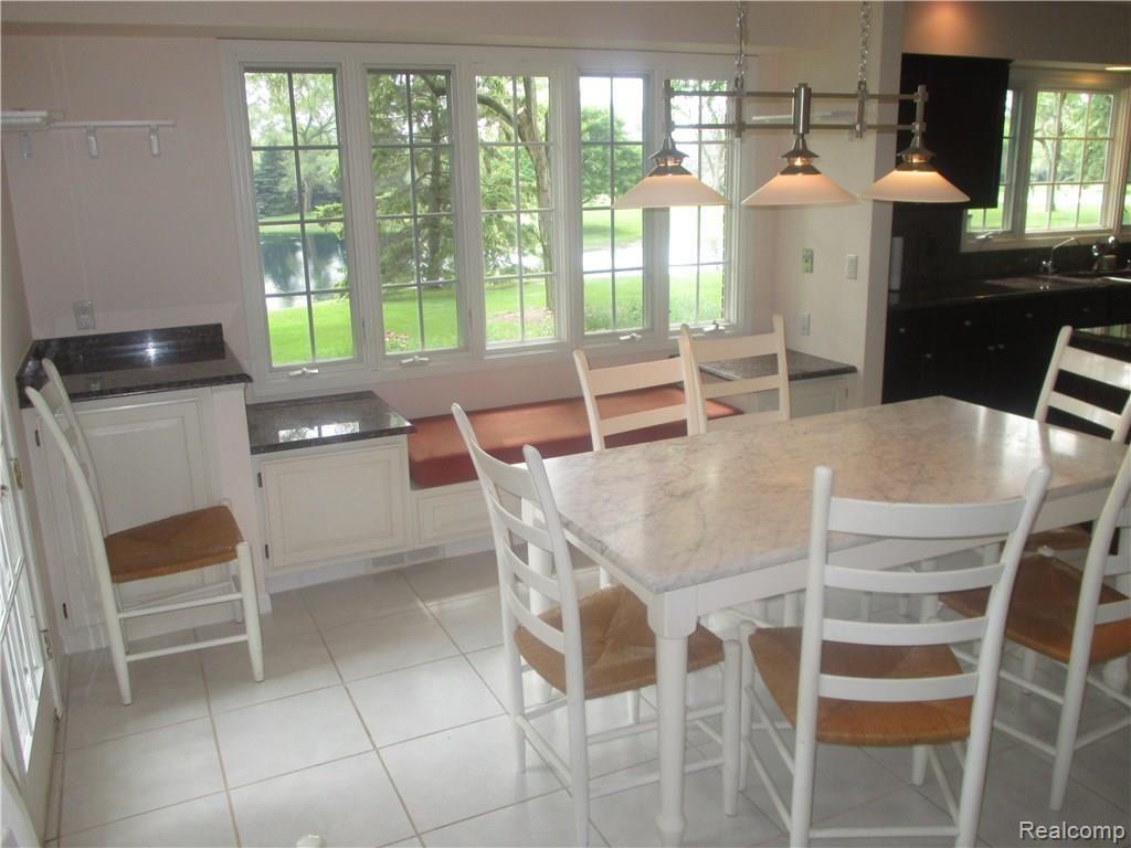 11465 Bruce N Lane Romeo, MI 48065 - Photo 33 of 43 Eating Nook with Lots of Windows and a Window seat For Extra Guests!
