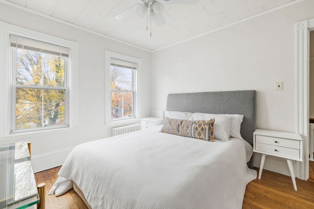 51 Denmark Avenue Milton, MA 02186 - Photo 11 of 18 a bedroom with a bed and a window