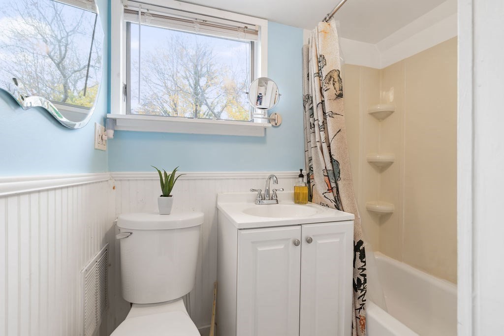 51 Denmark Avenue Milton, MA 02186 - Photo 13 of 18 a bathroom with a sink and a toilet