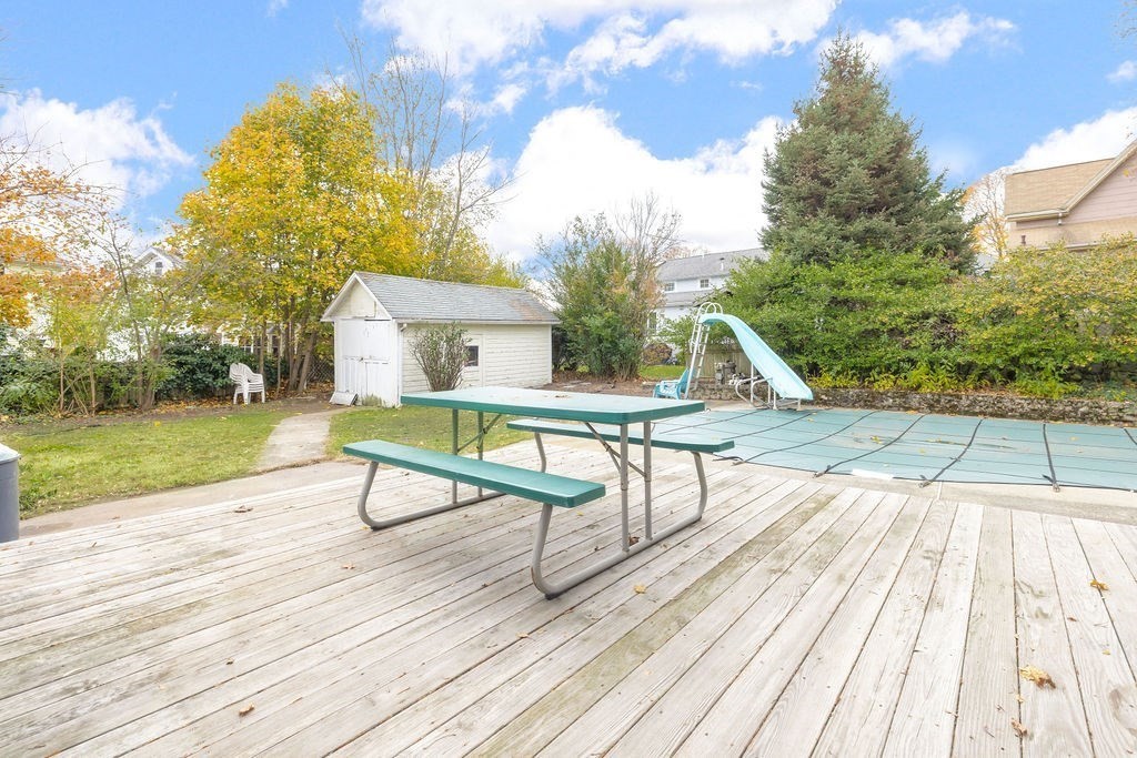 51 Denmark Avenue Milton, MA 02186 - Photo 16 of 18 a park view with a bench and wooden floor