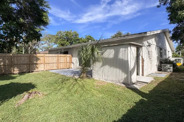 front view of a house with a big yard