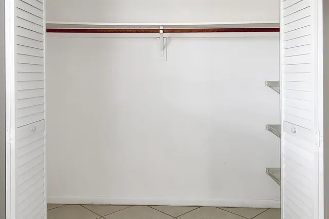 a bathroom with a sink toilet vanity and bathtub