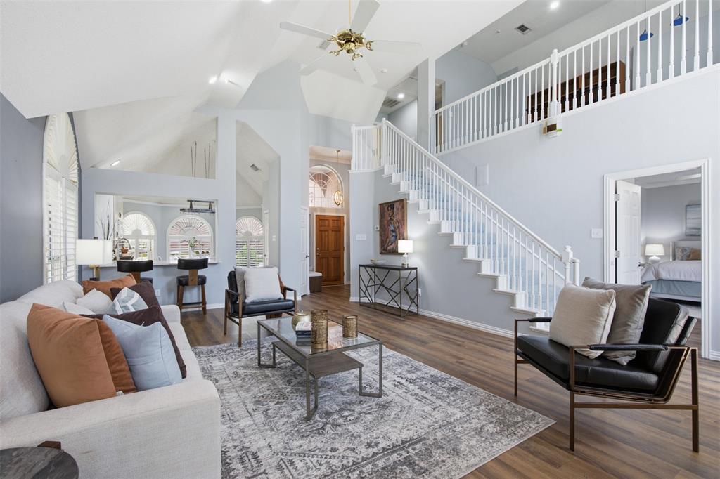14584 Blueberry Court Addison, TX 75001 - Photo 11 of 40 a living room with furniture and wooden floor