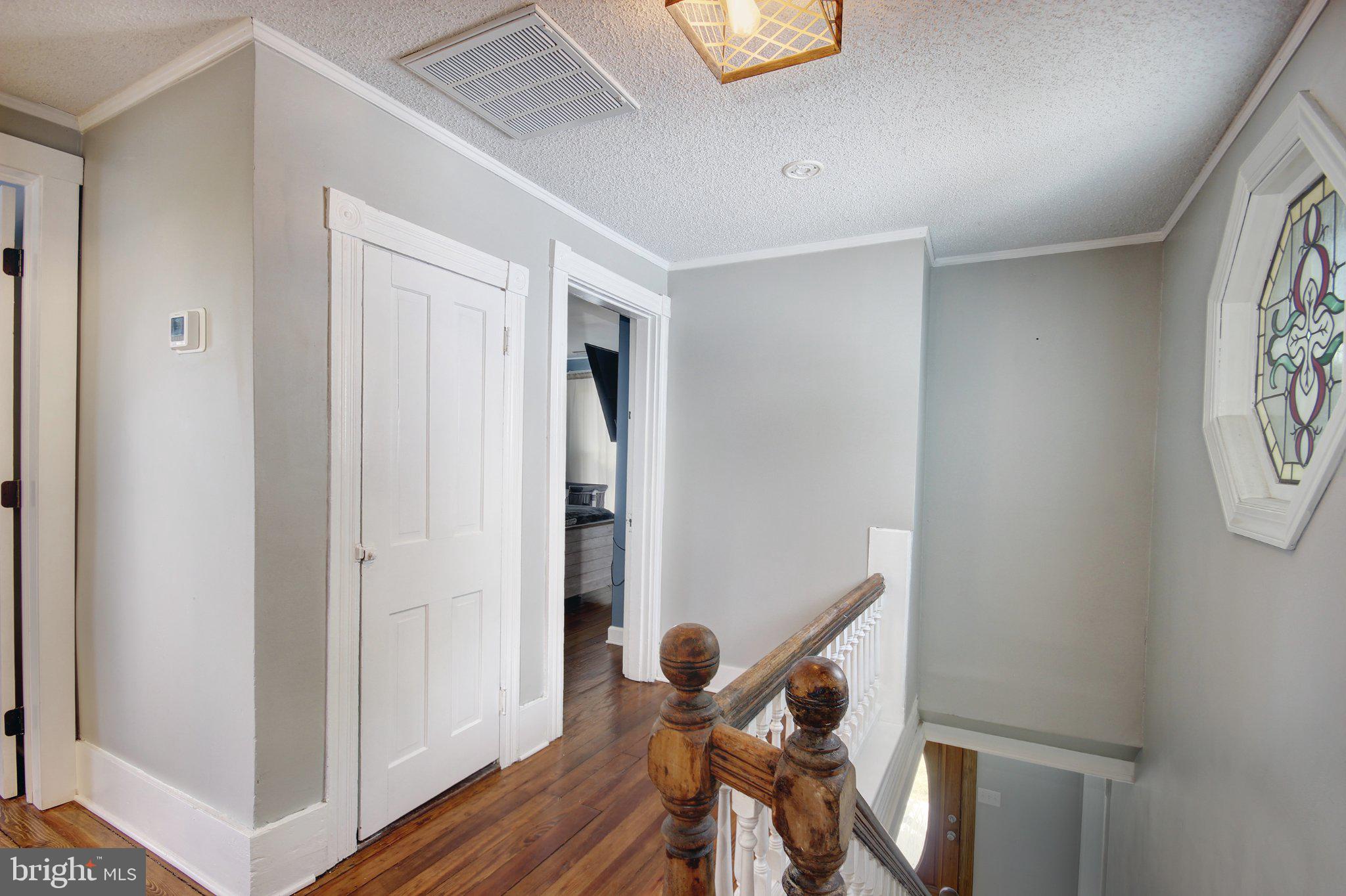 803 Market Street Denton, MD 21629 - Photo 17 of 27 Charming hallway with vintage details.