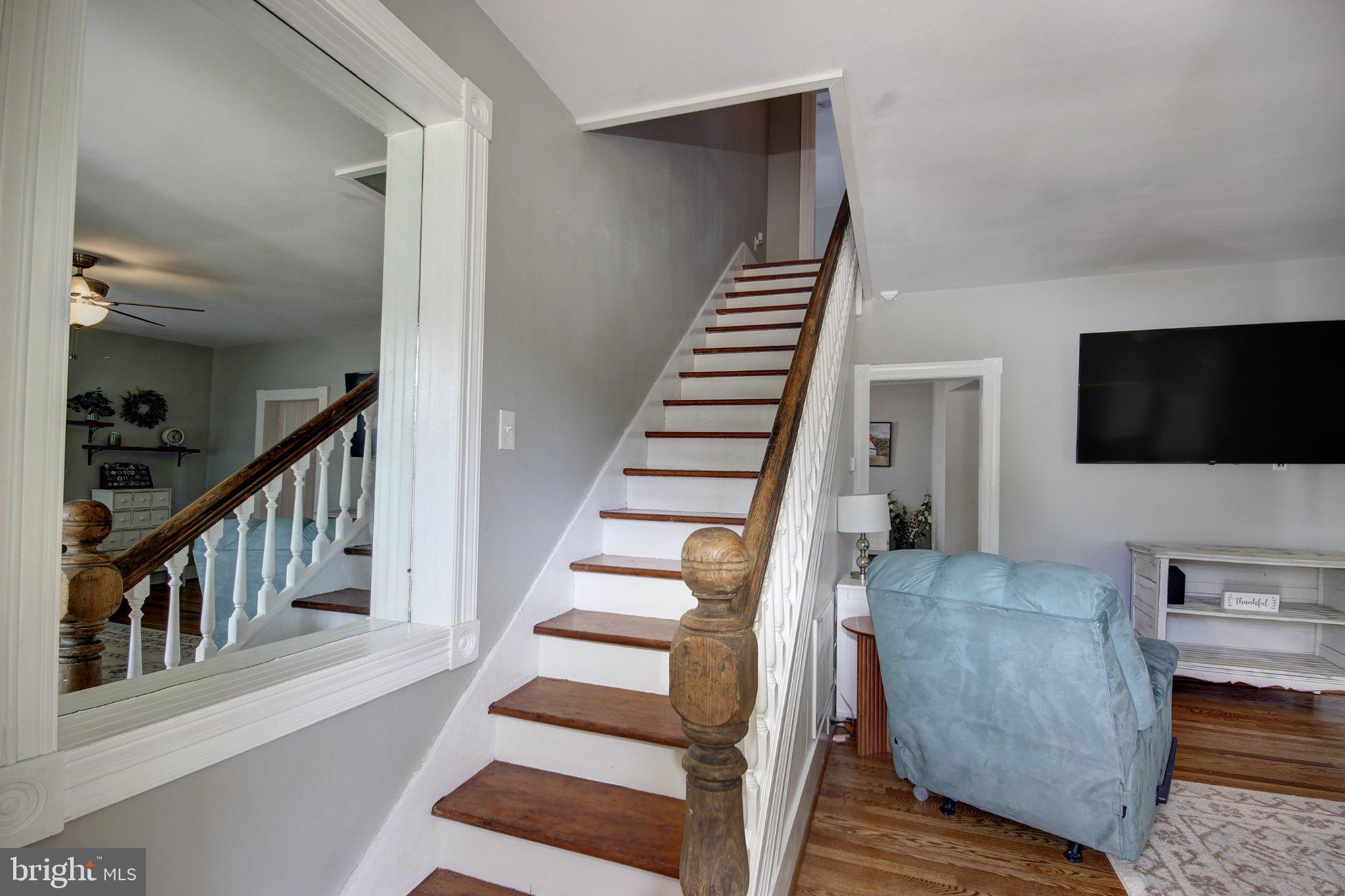 803 Market Street Denton, MD 21629 - Photo 9 of 27 Charming staircase in a cozy home.
