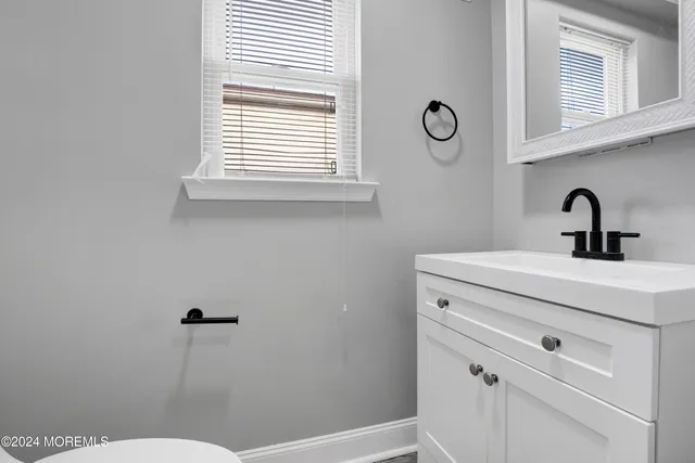 a view of a hallway with a chandelier