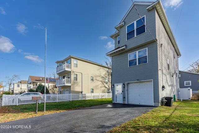 a view of a building with a yard
