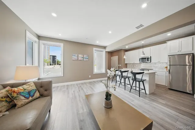 a living room with furniture and a couch