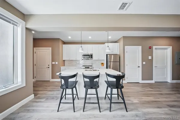 a view of a dining room with furniture