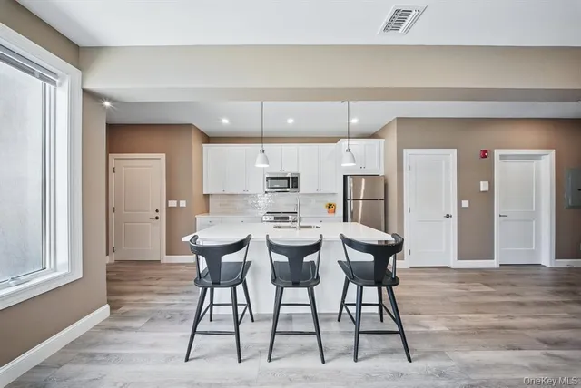 a view of a dining room with furniture