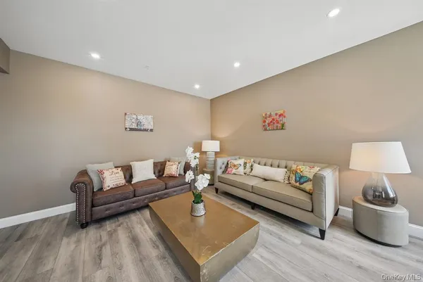 a kitchen with counter top space a sink appliances and cabinets