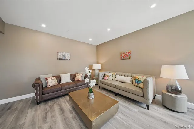 a kitchen with counter top space a sink appliances and cabinets