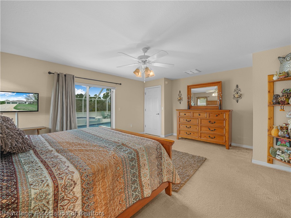 5721 Golden Road Sebring, FL 33875 - Photo 16 of 42 With SGD leading to the pool & lanai