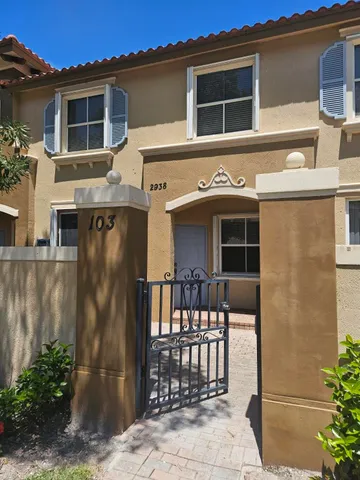 a front view of a house with a porch