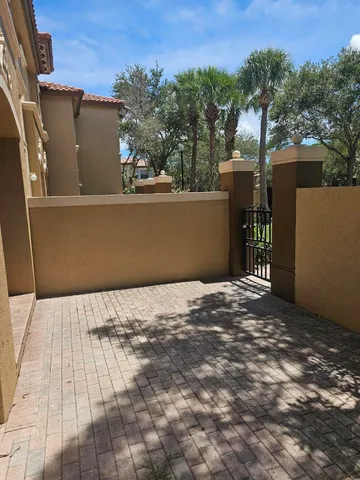 a view of a backyard of a house