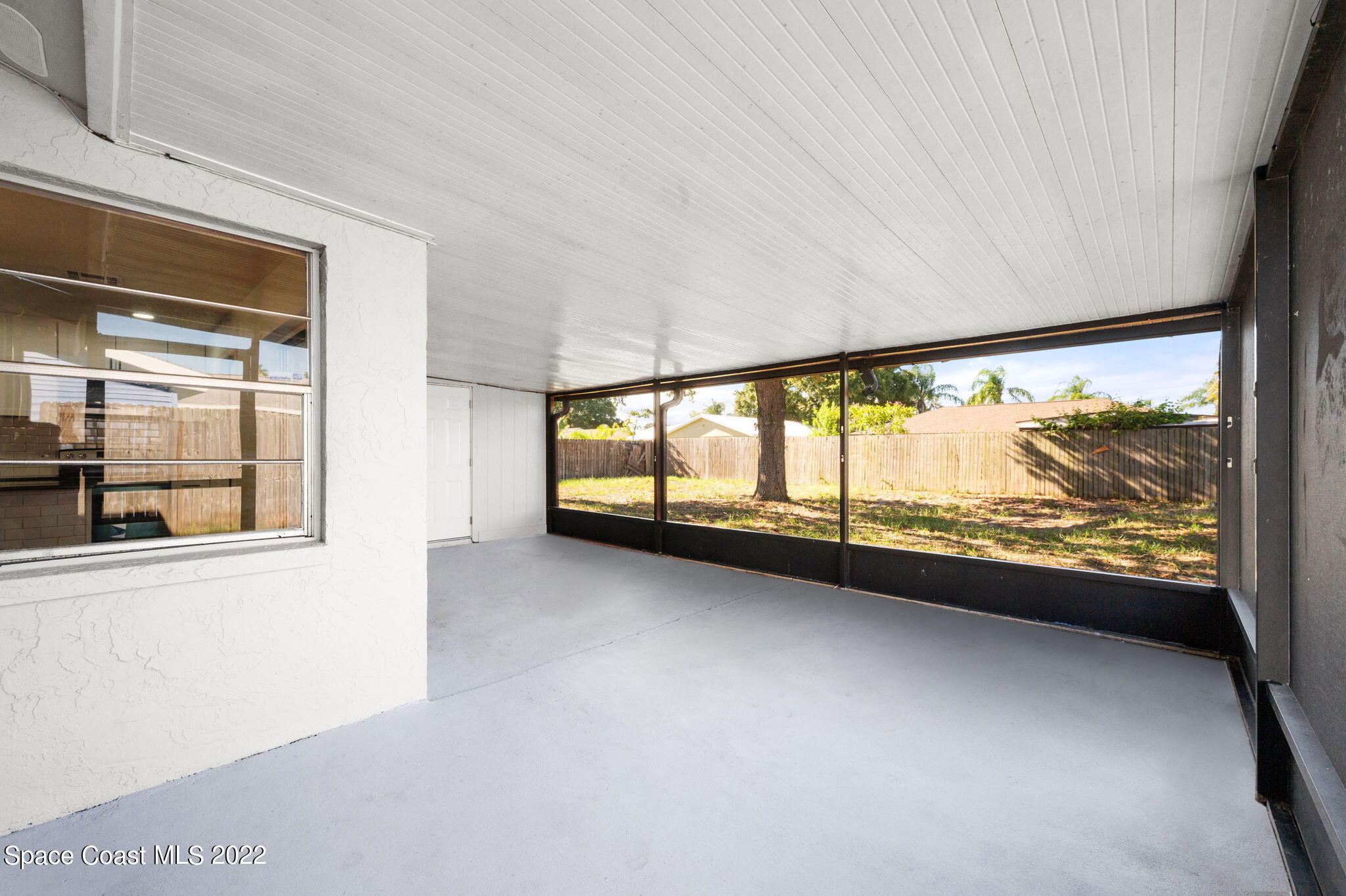 2856 Lancaster Road Melbourne, FL 32935 - Photo 19 of 22 a view of an empty room with a window