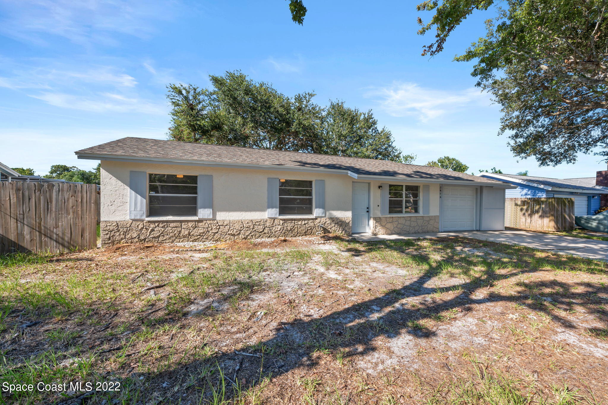 2856 Lancaster Road Melbourne, FL 32935 - Photo 2 of 22 a view of a house with a patio