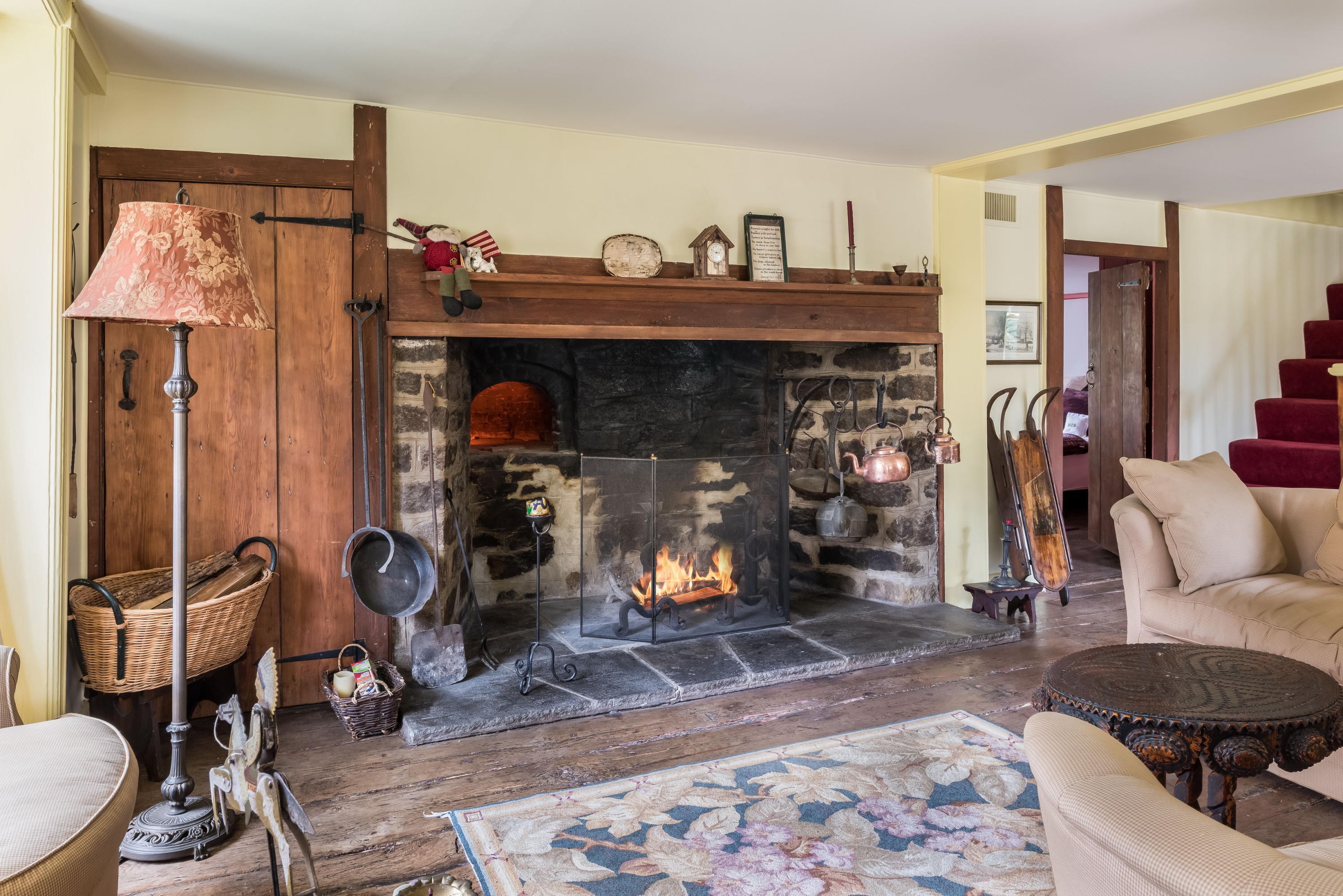258 Hollow Tree Ridge Road Darien, CT 06820 - Photo 7 of 28 a view of a livingroom with furniture and a fireplace