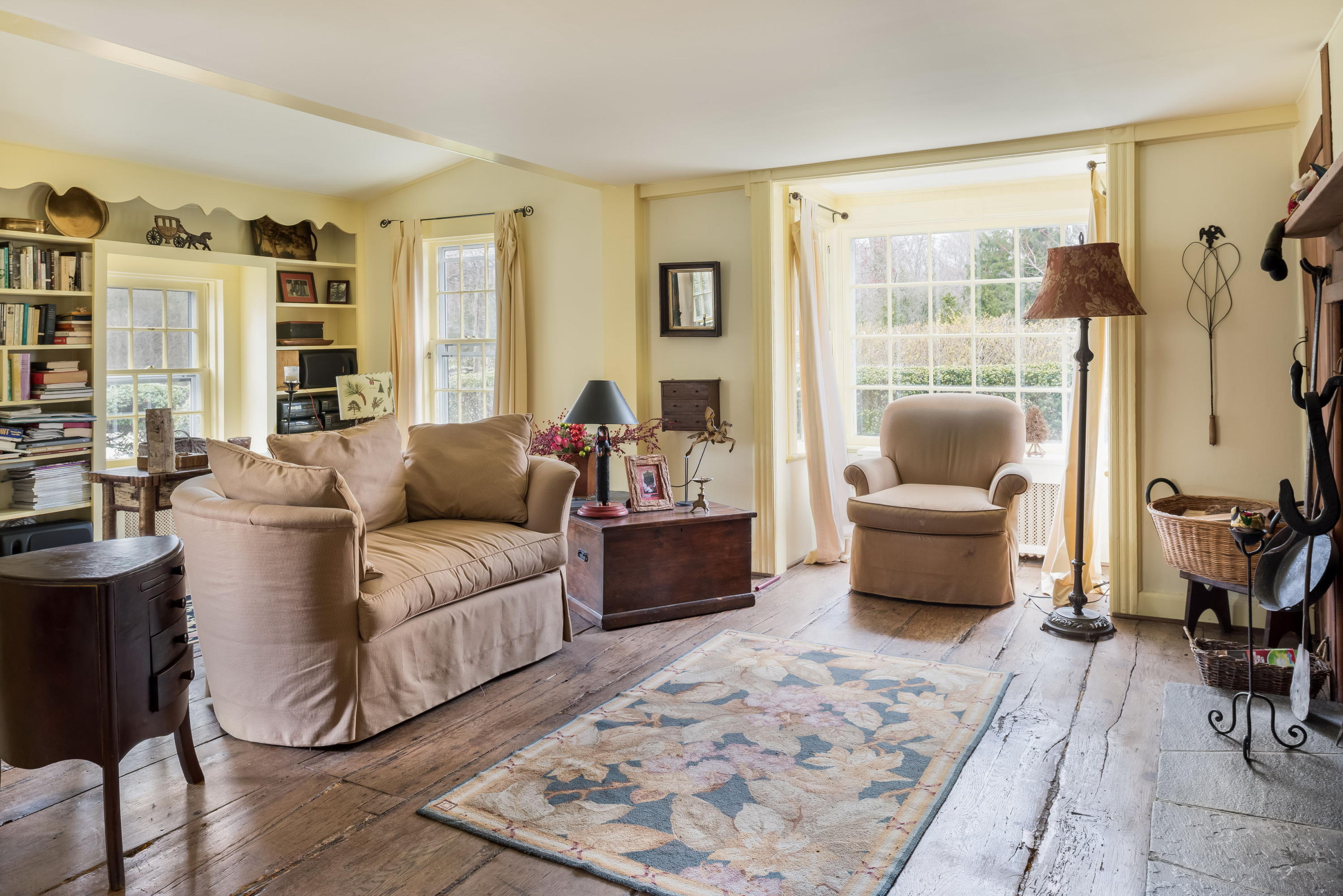 258 Hollow Tree Ridge Road Darien, CT 06820 - Photo 8 of 28 a living room with furniture rug and a large window
