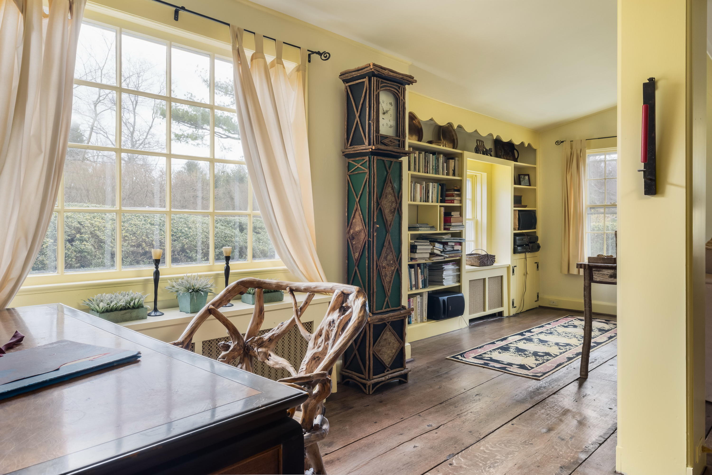 258 Hollow Tree Ridge Road Darien, CT 06820 - Photo 9 of 28 a living room with furniture and a window