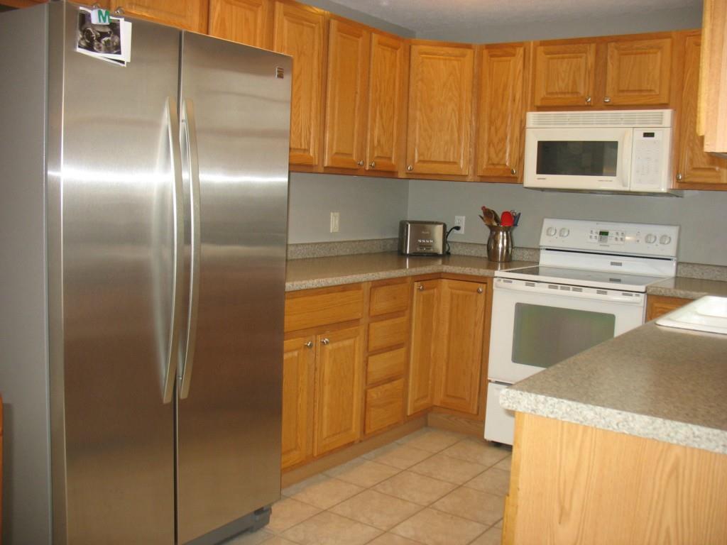 61 Ocean Park Road, Unit 1 Saco, ME 04072 - Photo 7 of 18 Fully applianced kitchen includes...