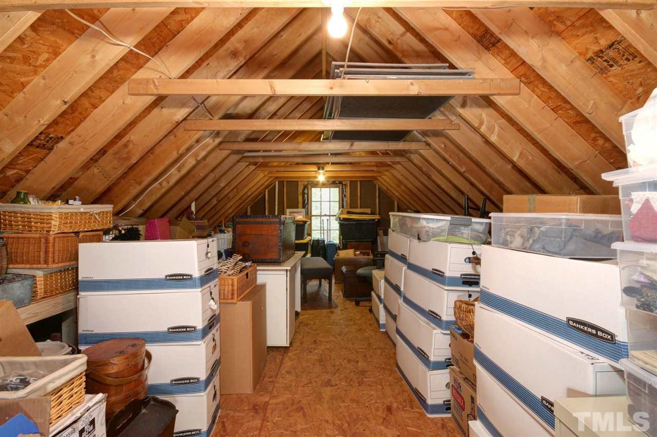 5216 Caber Road Raleigh, NC 27613 - Photo 22 of 25 a view of storage and utility room