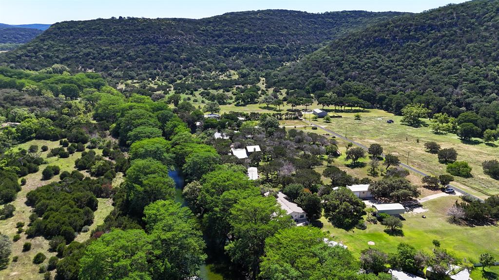 187 Roy Chisum Road Leakey, TX 78873 - Photo 3 of 40 a view of outdoor space and mountain view