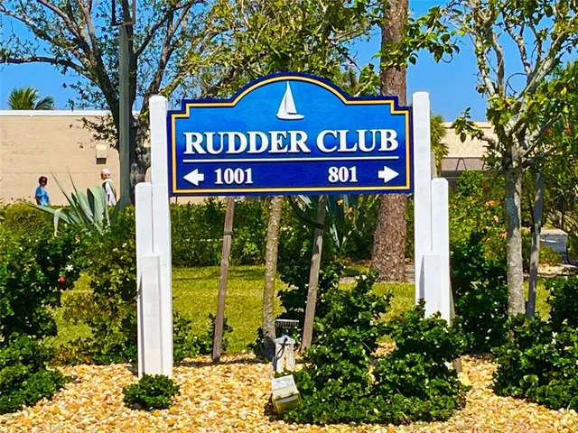 a view of a park with large trees