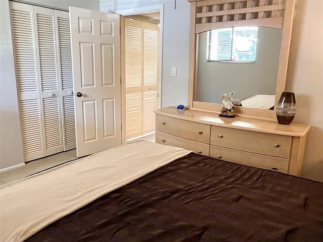 an aerial view of a house with a garden and swimming pool