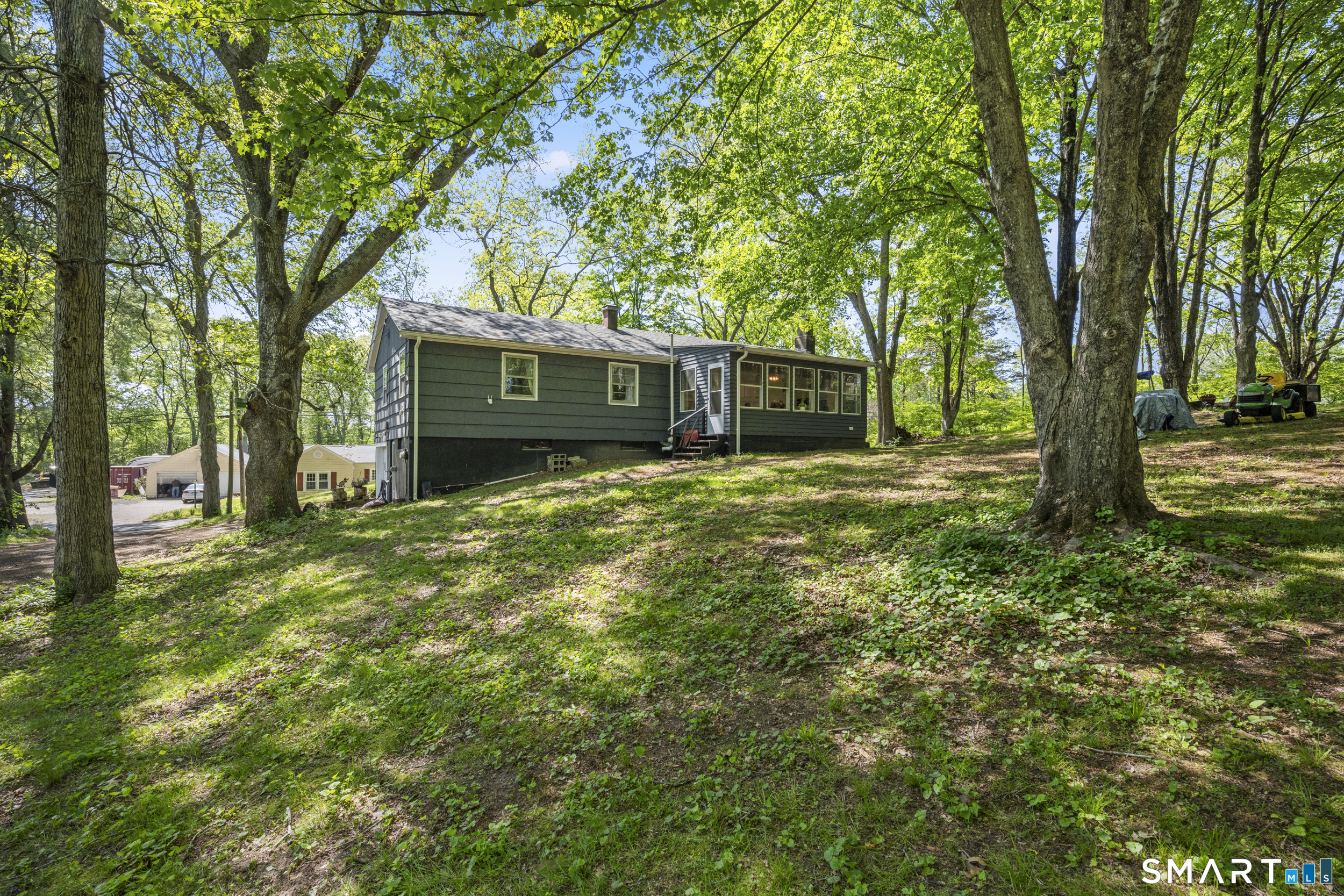 121 River Road Preston, CT 06365 - Photo 30 of 37 a view of a house with a yard