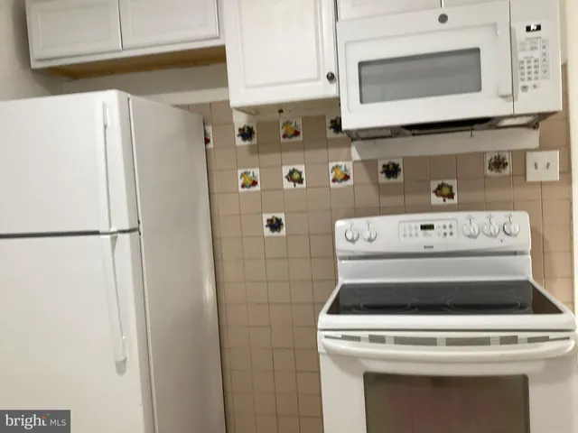 a close view of a stove in the kitchen