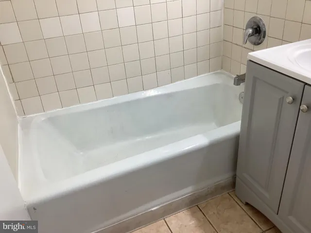 a bathroom with a bathtub