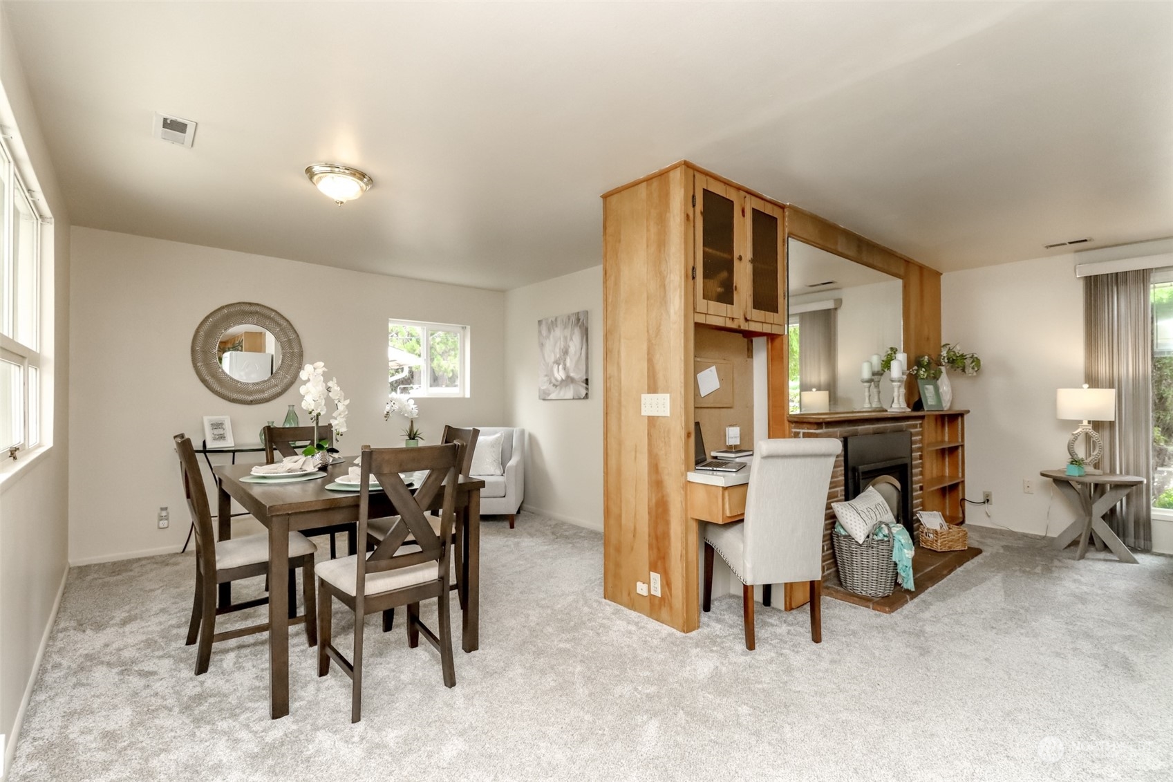 3401 Northeast 10th Street Renton, WA 98056 - Photo 6 of 25 a dining room with furniture and a chandelier
