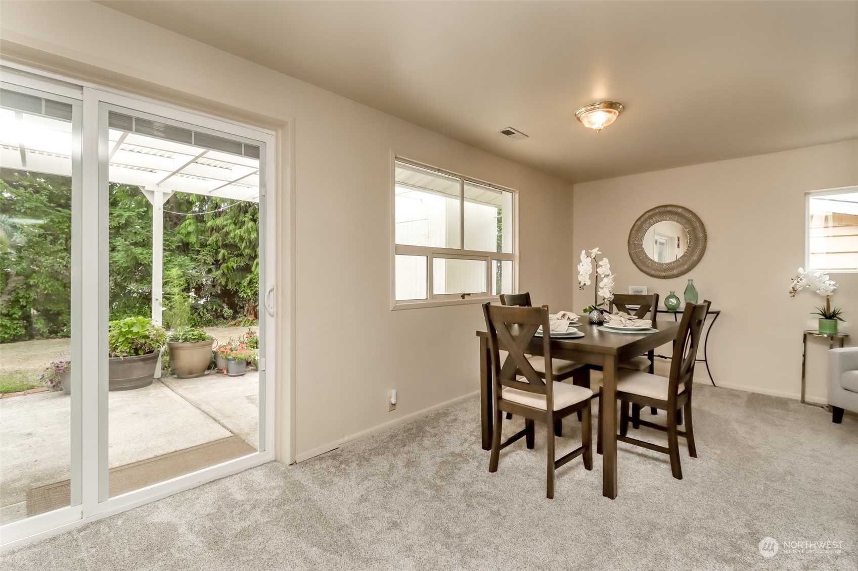 3401 Northeast 10th Street Renton, WA 98056 - Photo 8 of 25 a dining room with furniture and window