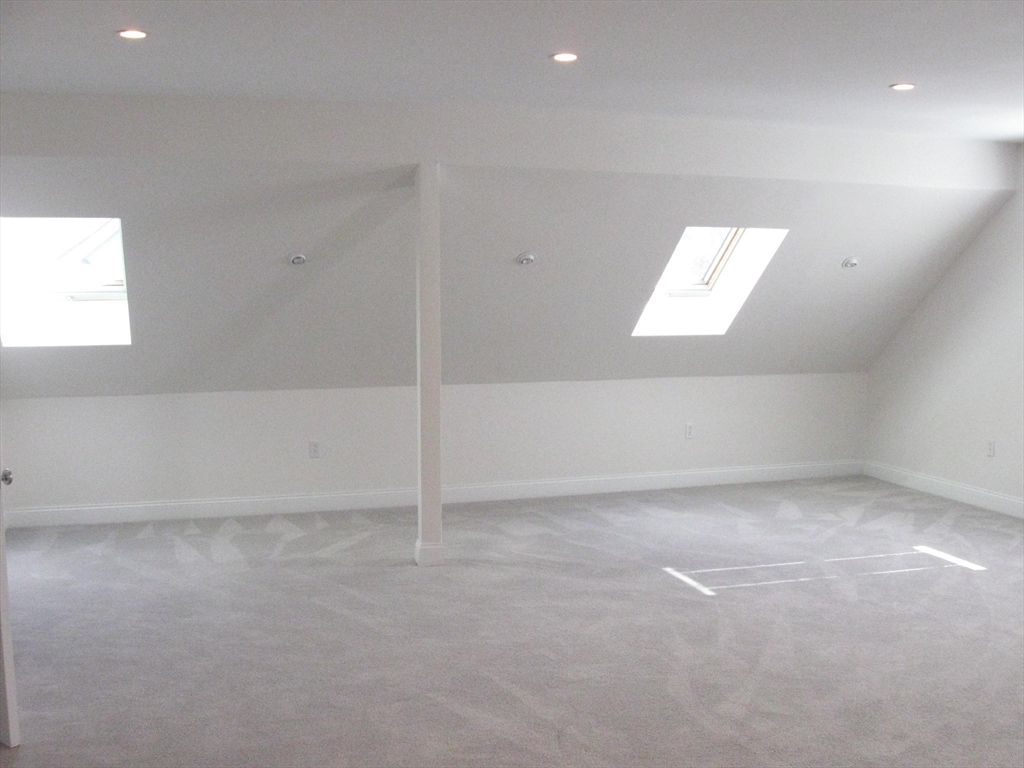 2856 Washington Street Boston, MA 02119 - Photo 19 of 39 a view of an empty room with a window