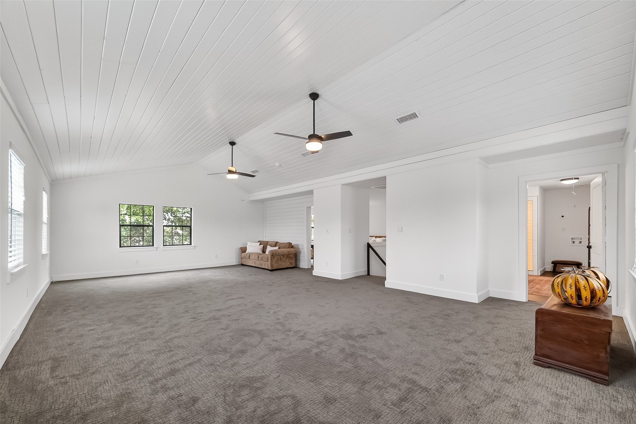 1808 Tabor Street Houston, TX 77009 - Photo 17 of 26 an empty room with windows and cabinet